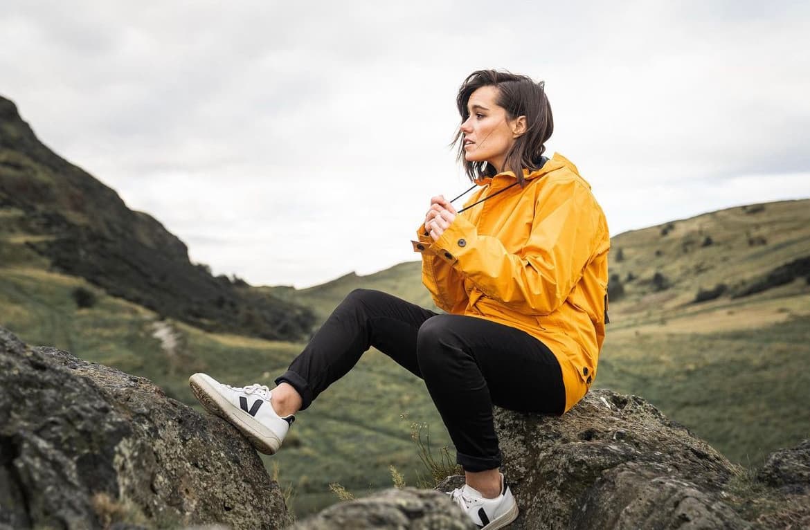 women in meander yellow jacket