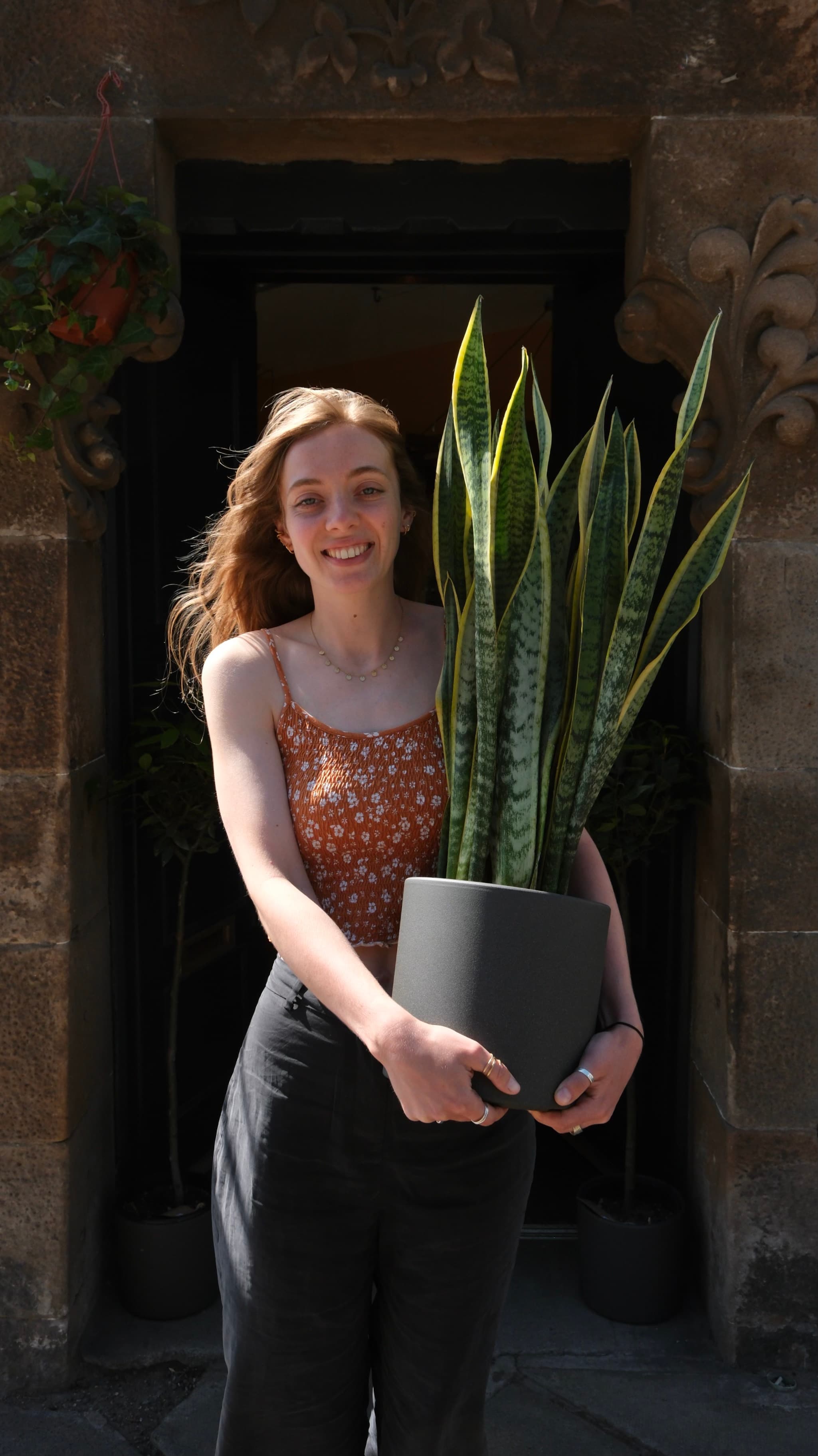 Evie at grow urban with favourite plant